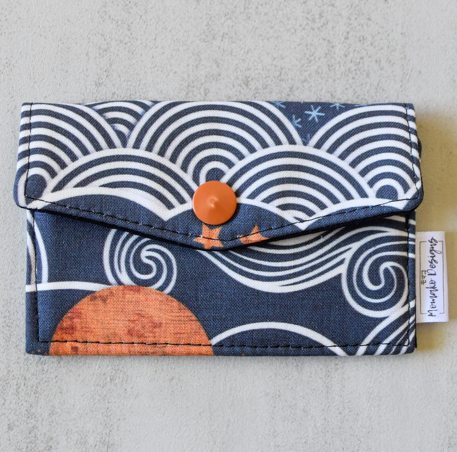 Clutches, Wallets, Card Holders, and Sling Bags by Momako Designs