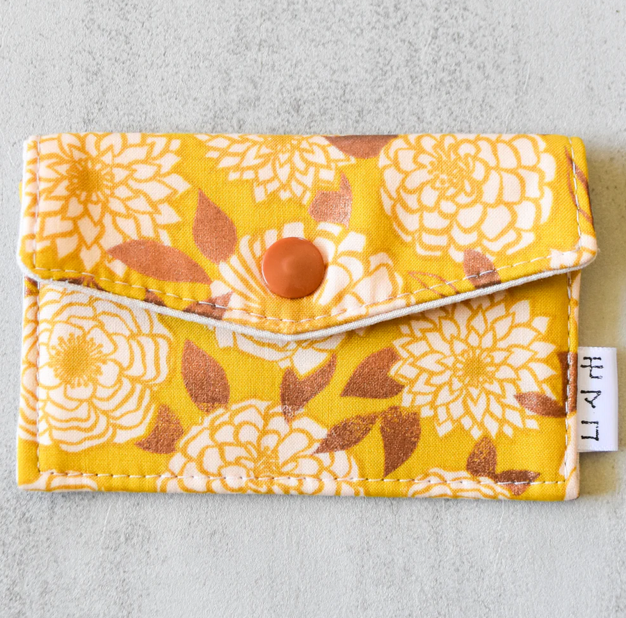 Clutches, Wallets, Card Holders, and Sling Bags by Momako Designs