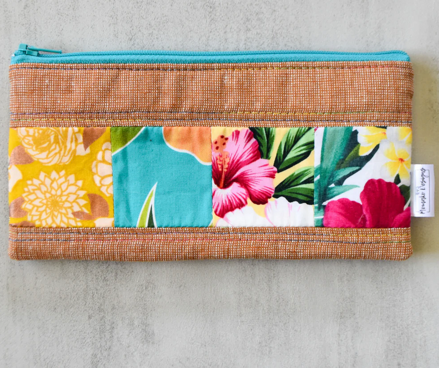 Clutches, Wallets, Card Holders, and Sling Bags by Momako Designs